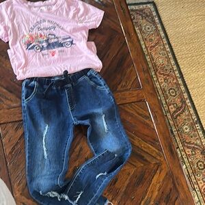 Pink Graphic Tee and Blue Distressed Jeans